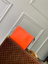 Load image into Gallery viewer, LOUIS EMBOSSED MONOGRAM POUCH (ORANGE)