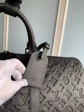 Load image into Gallery viewer, LOUIS KEEPALL BANDOULIERE 50 EMBOSSED MONOGRAM TAURILLION (BLACK)