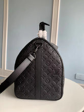 Load image into Gallery viewer, LOUIS KEEPALL BANDOULIERE 50 EMBOSSED MONOGRAM TAURILLION (BLACK)