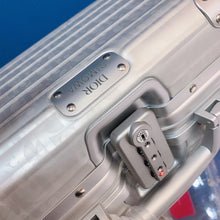 Load image into Gallery viewer, RIMOWA X CHRISTIAN OBLIQUE TRAVEL CASE (SLIVER)