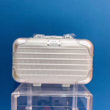 Load image into Gallery viewer, RIMOWA X CHRISTIAN OBLIQUE TRAVEL CASE (SLIVER)