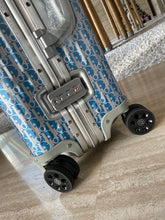 Load image into Gallery viewer, RIMOWA X CHRISTIAN 36L GRADIENT BLUE OBLIQUE