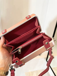 RIMOWA X CHRISTIAN CROSS BODY BAG (RED)